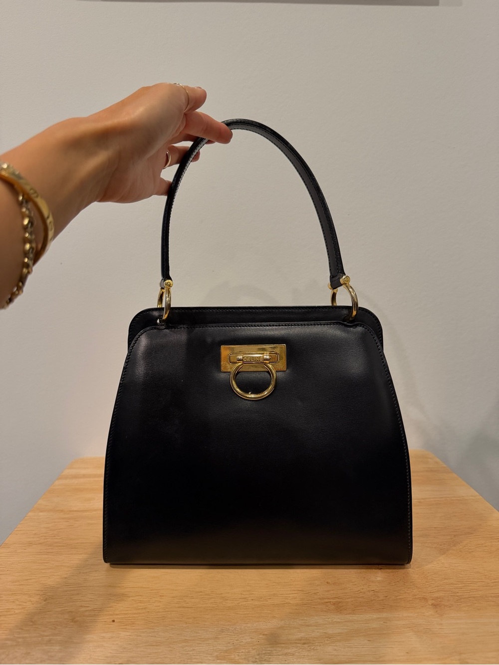 CELINE 70โs-80s Structured Black Leather Top-Handle Handbag with Gold Hardware